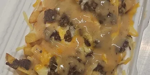 DIRTY HAGGIS FRIES cheese, haggis, peppercorn sauce